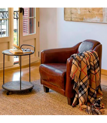 Aged cowhide armchair